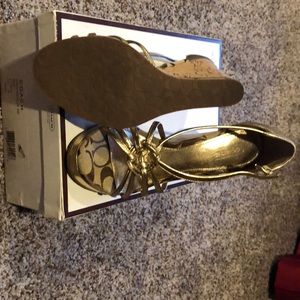 Coach jostling metallic kid LT gold 6M.